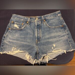 Levi's light blue denim shorts with tan leather patch